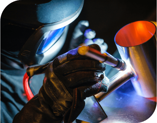 man performing a tig weld