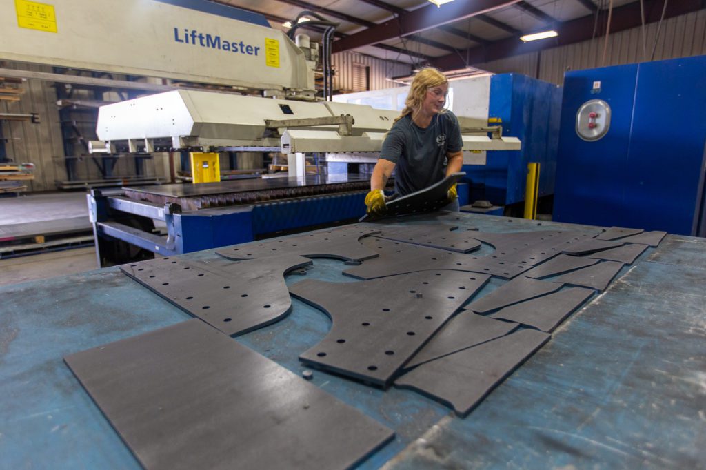 Laser cut materials lay on a table