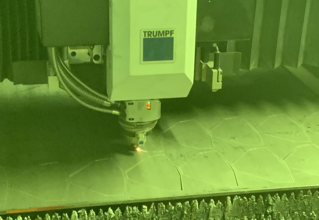 An inside look at the Trumpf TruLaser 5030 fiber laser at work.