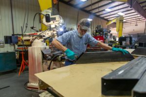 Local fab shop fabricator works on a project.